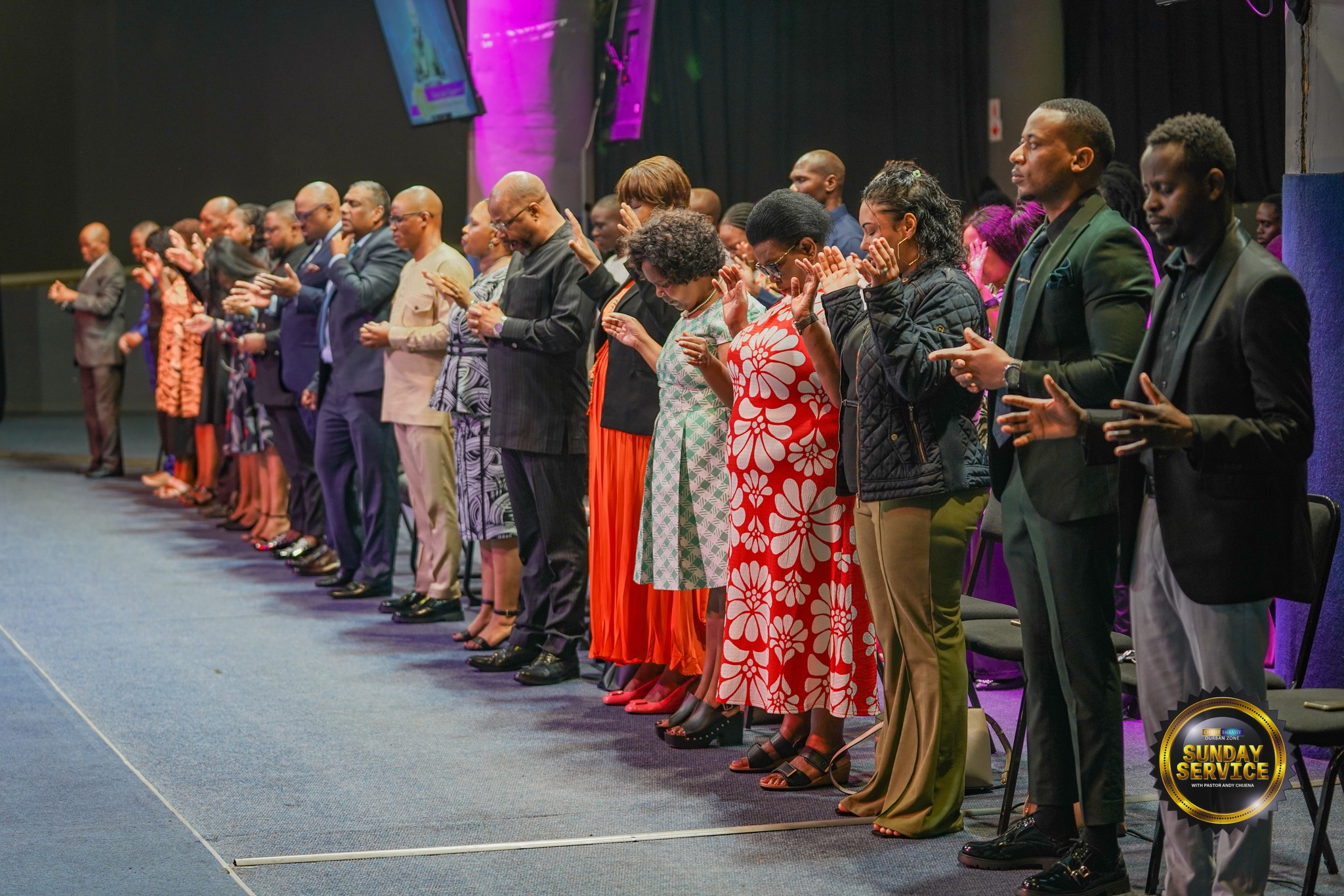 Prayer during a Christ Embassy Durban service